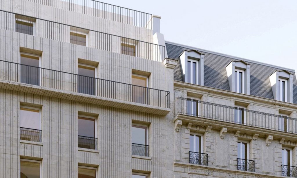 Façade en pierre porteuse d’un bâtiment neuf à Paris avec balcon en pierre et structure béton armé – étude PRATEC